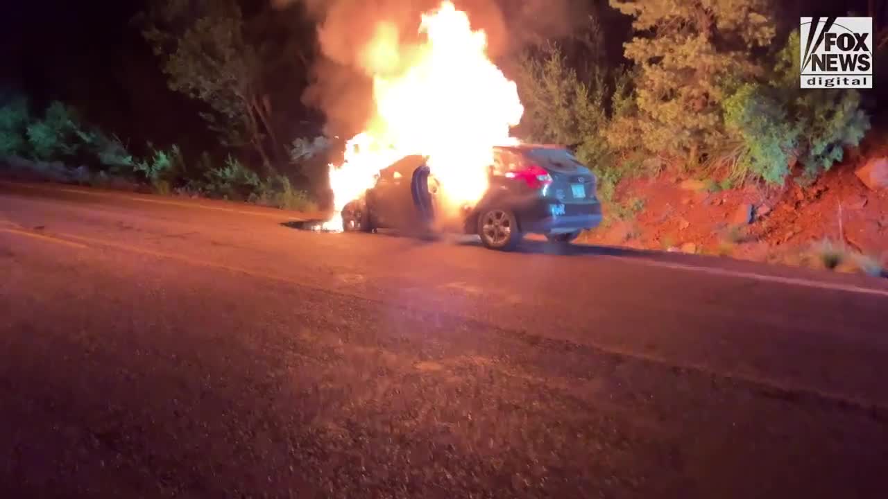 Đời sống - Người đàn ông dũng cảm cứu 2 bé gái khỏi chiếc xe đang bốc cháy 