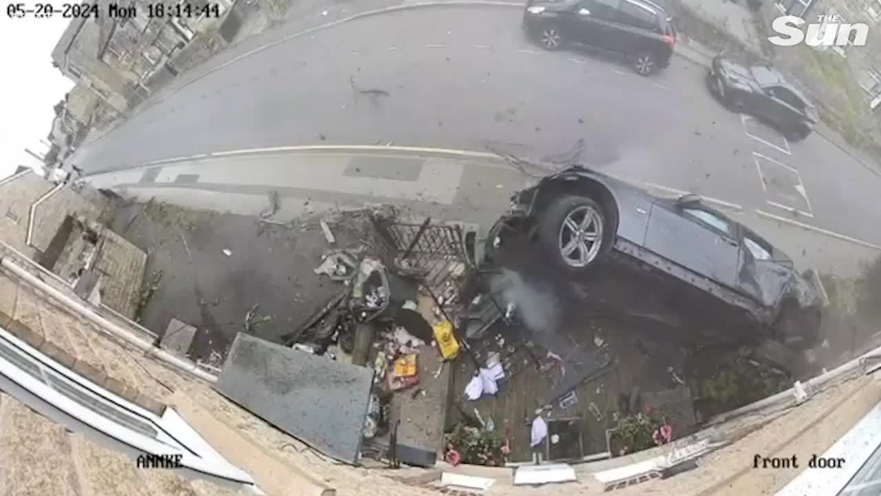 Video - Clip: BMW mất lái tông vào nhà dân như phim hành động và cái kết