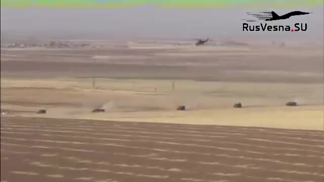 Trực thăng Nga cùng tổ đội xe vũ trang vây hãm quân đội do Mỹ dẫn đầu ở Syria