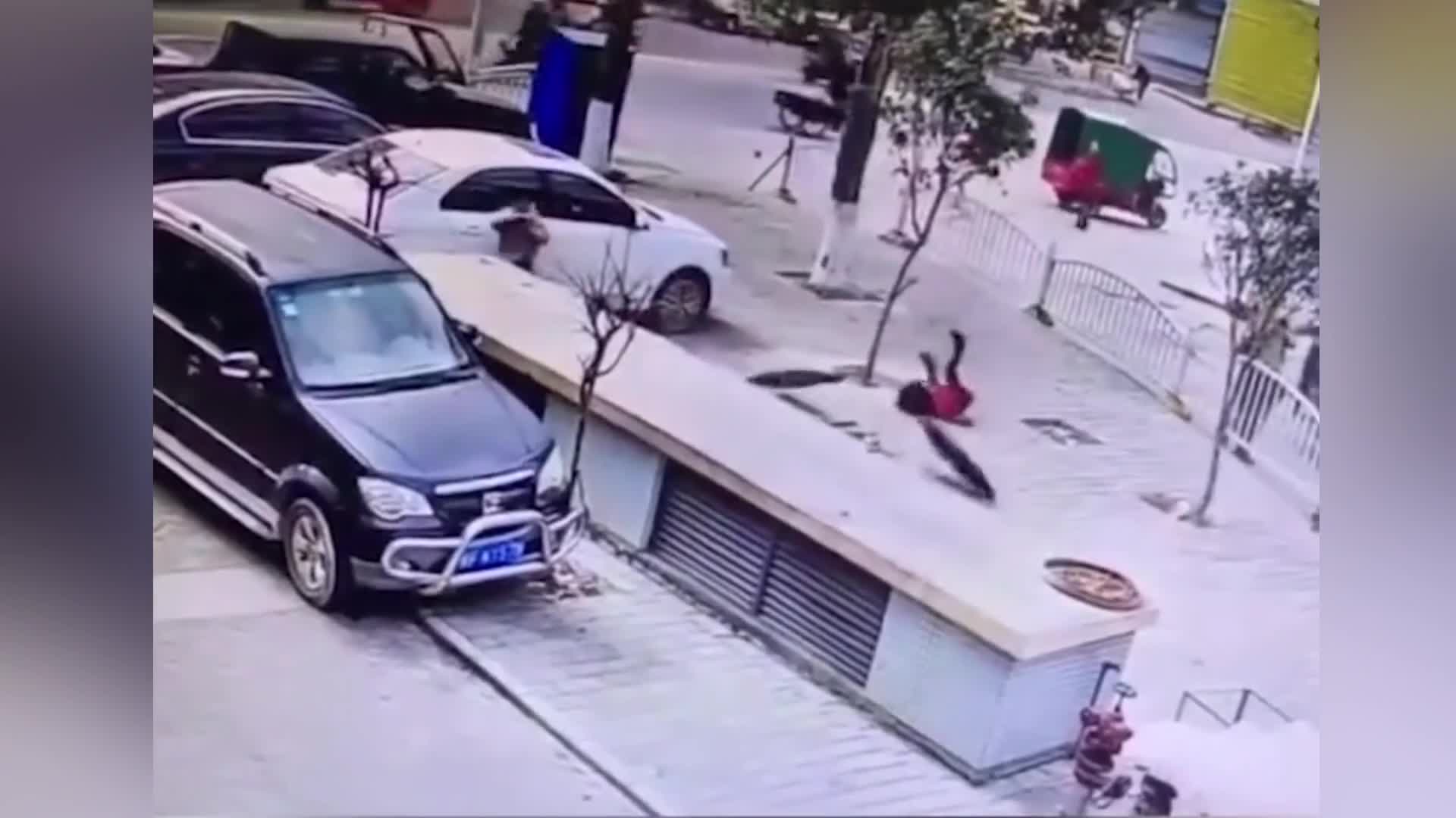 Newsflare - Manhole explosion sends boy into air after he throws lit firecracker inside in southern China